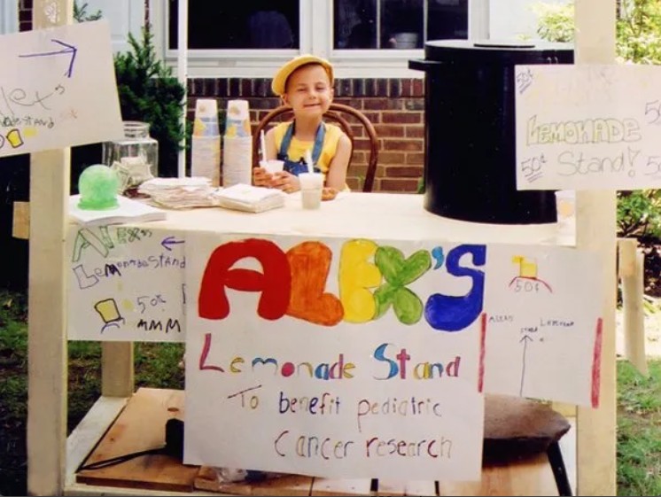 Young Alex Scott at her original lemonade stand, 2000